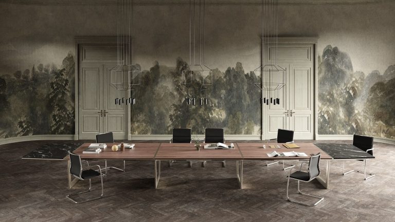 conference room table defining a hybrid space for formal meetings and collaborative teamwork.